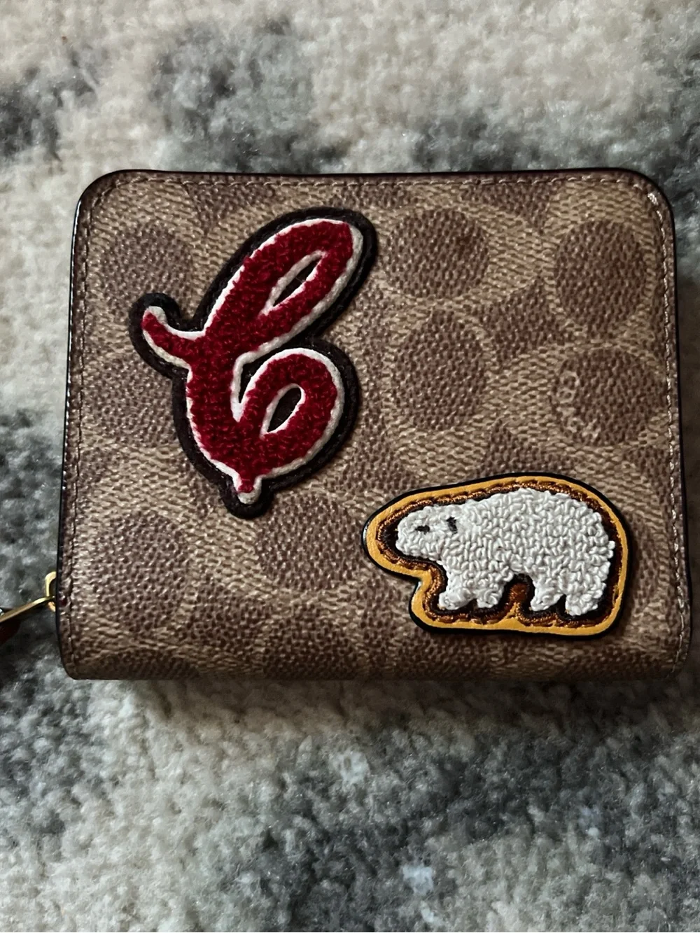 Coach Brown Signature wallet with Red Script and White Bear Patch